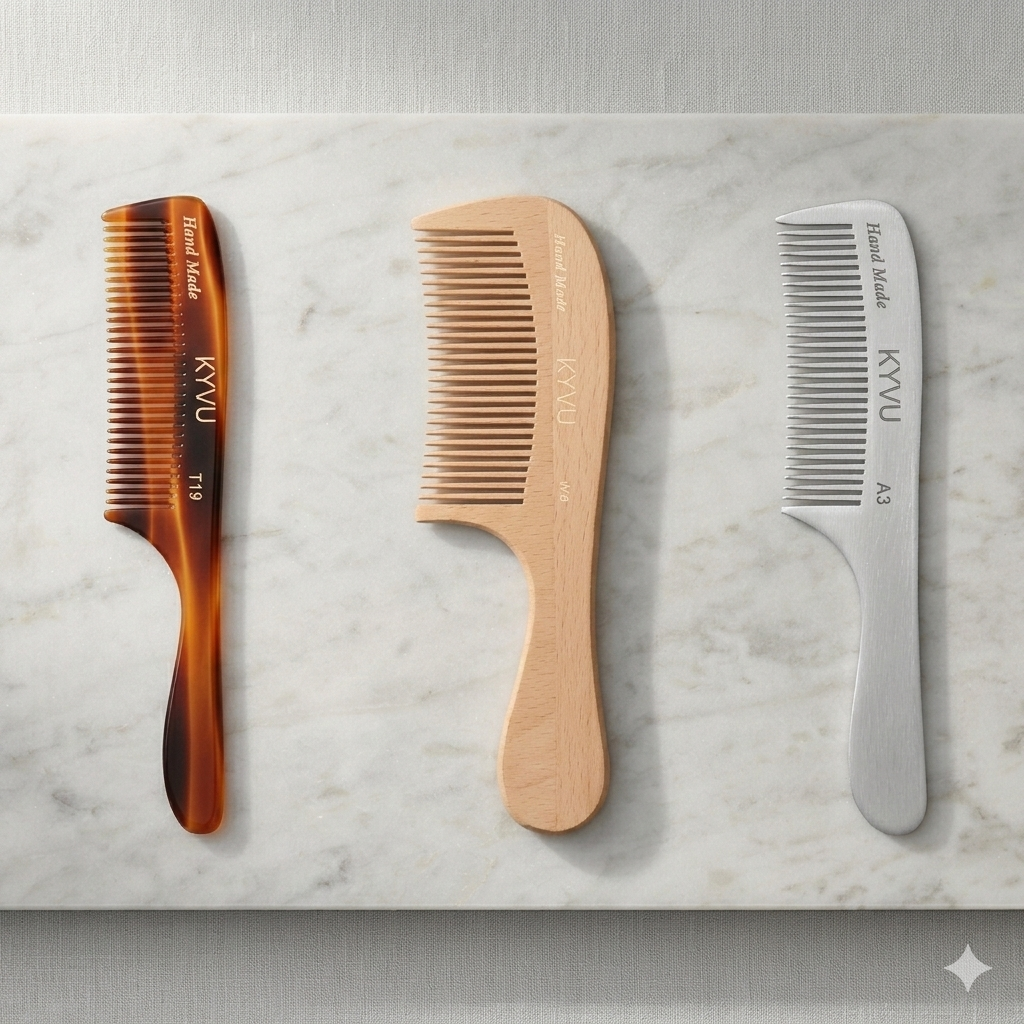 Three KYVU handmade combs side by side — cellulose acetate tortoiseshell, beechwood and 6163-grade aluminium comb comparison on marble surface